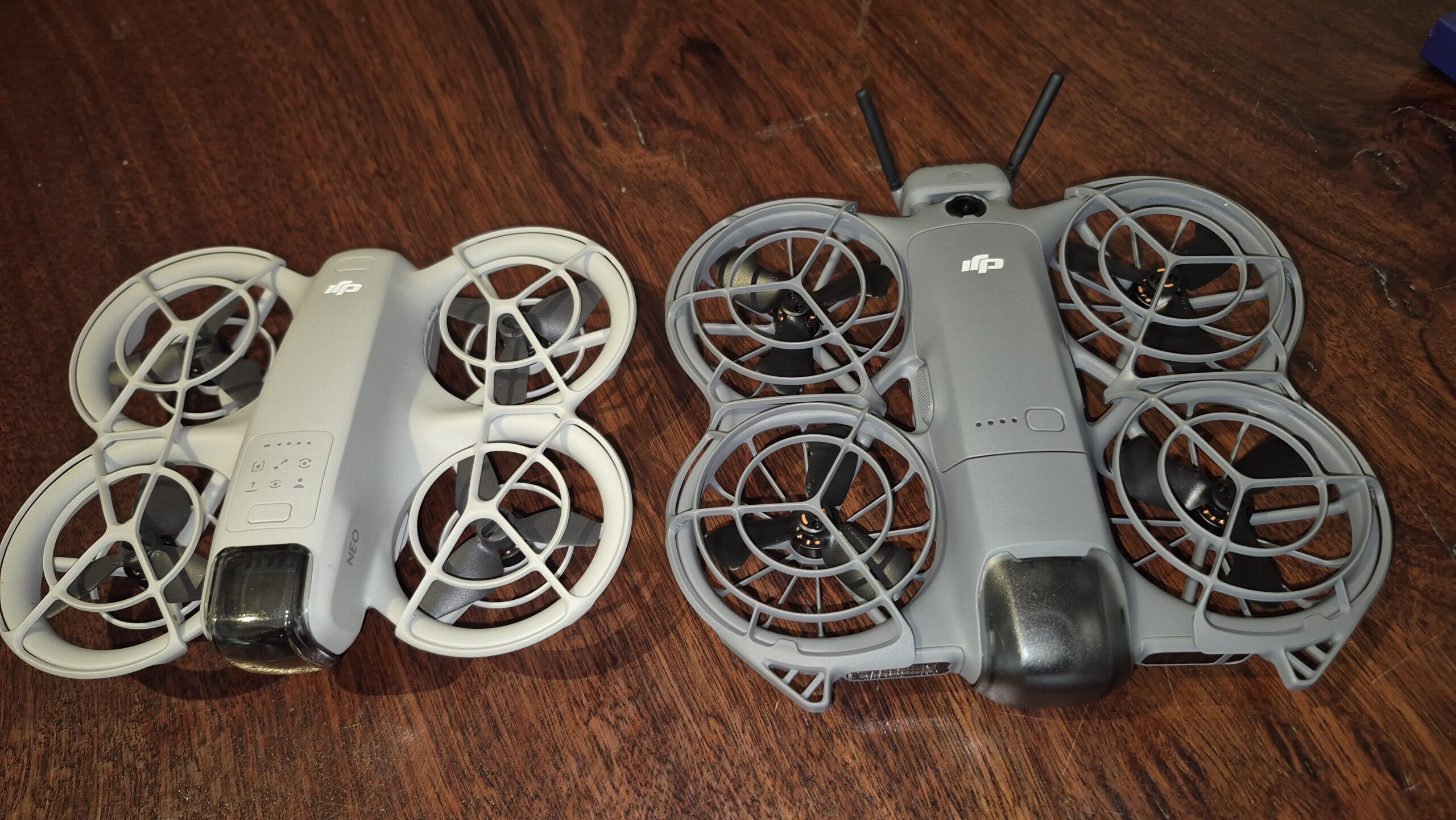 DJI NEO 2 with the original NEO. Note the addition of the wireless receiver at the rear on the NEO 2